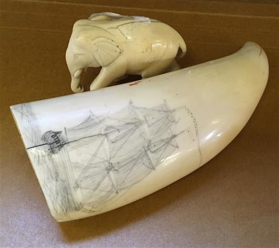 A Scrimshaw whales tooth, ivory elephant figure